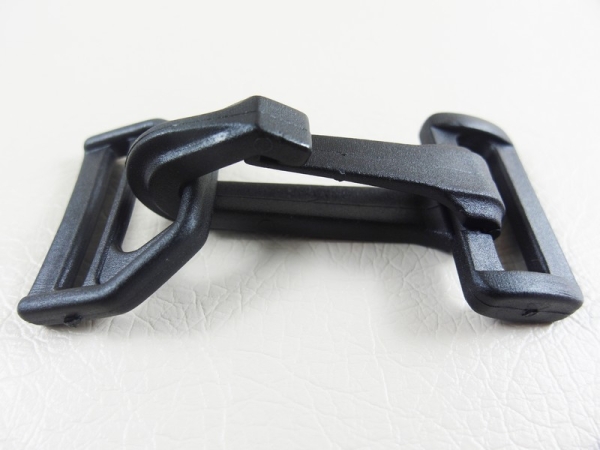 Kunststoffverschluss für Taschen - Modell " X " 25 mm schwarz