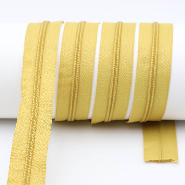 Endless zippers loose - per meter - spiral (5mm) mustard gold