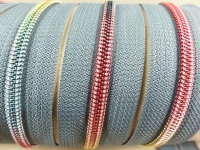 Endless zippers model "Brilliant" No. 7 / with rainbow spiral / gray