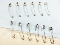 Set of 12 curved safety pins 38 x 10 mm