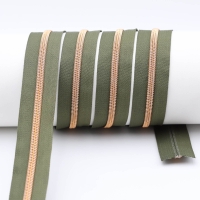 Endless zippers model "Brilliant" No. 7 with rose gold spiral in kiwi green