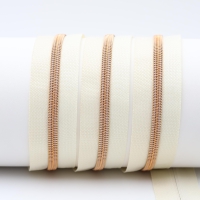 Endless zippers model "Brilliant" No. 7 with rose gold spiral cream