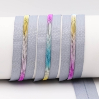 Endless zippers model "Brilliant" No. 7 / with metallized rainbow spiral light gray-rainbow